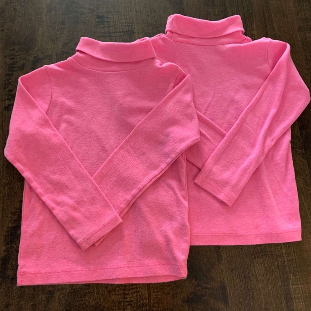 Carter’s light pink turtlenecks